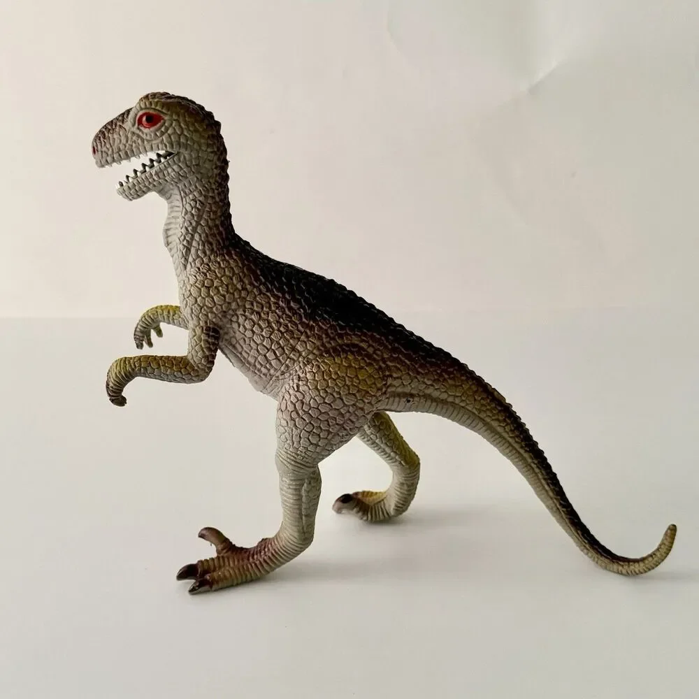 Lot of 4 Vintage Assorted Dinosaurs Plastic/Rubber Embossed - Up to 8.5
